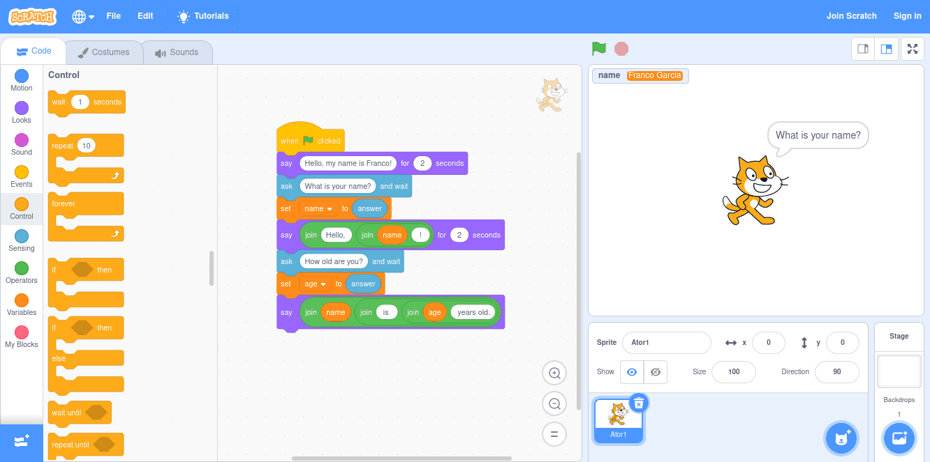 Example of visual programming in Scratch with two variables: one with the type string, another with type integer.